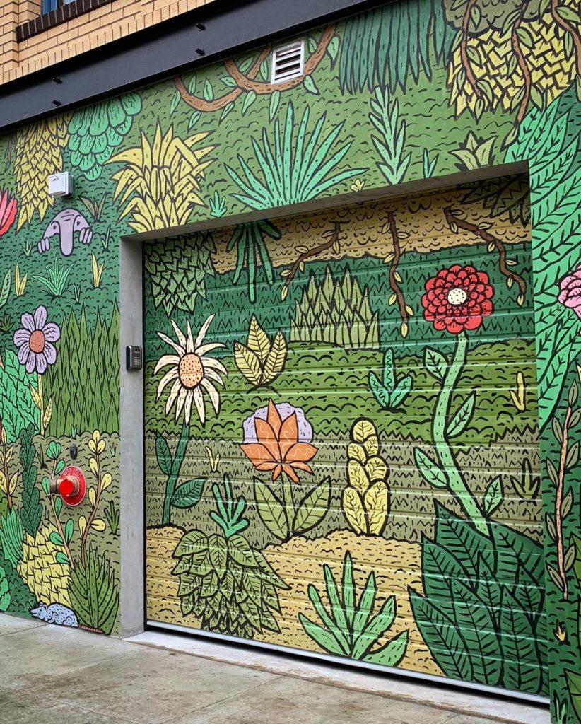Garage door with floral mural