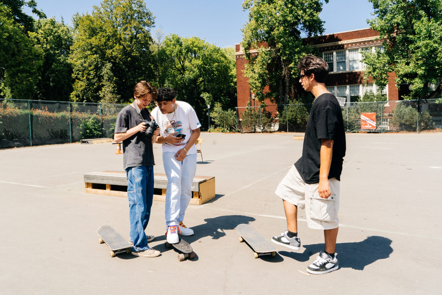 Young skaters talking outside